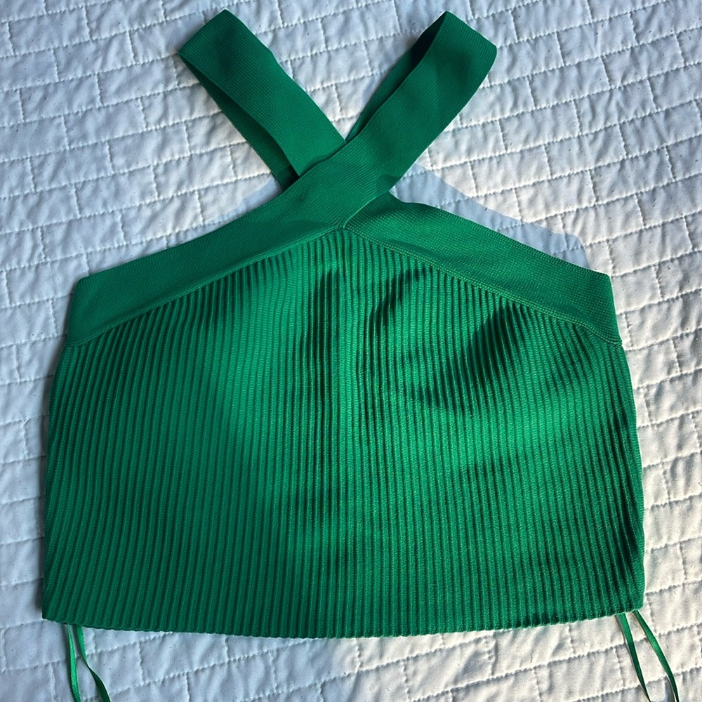 Cropped going out top